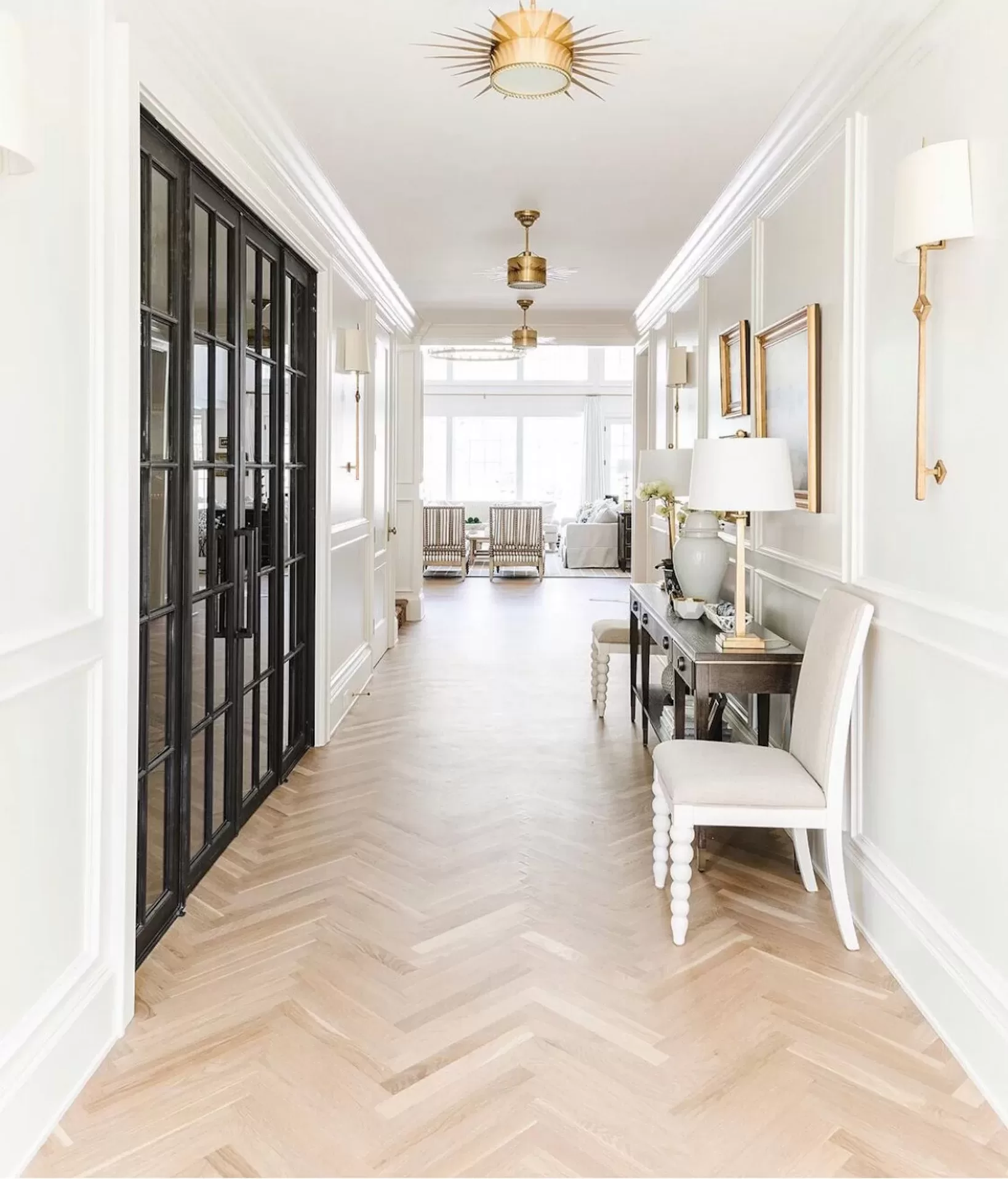 Bright office corridor with neutral flooring and clean architectural lines