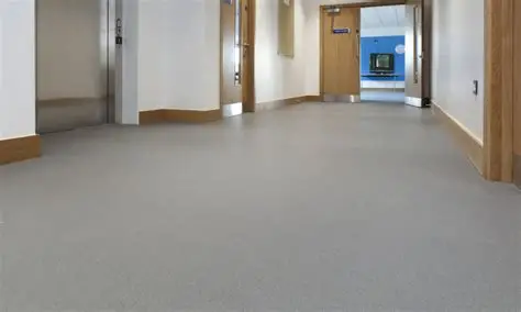 Freshly renovated commercial hallway with smooth epoxy flooring and clean finish.