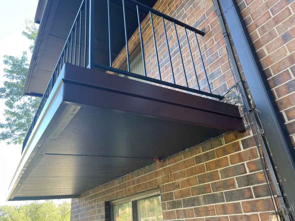 Structural balcony repair featuring reinforced supports and safety upgrades.